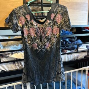 Sinful woman’s shirt